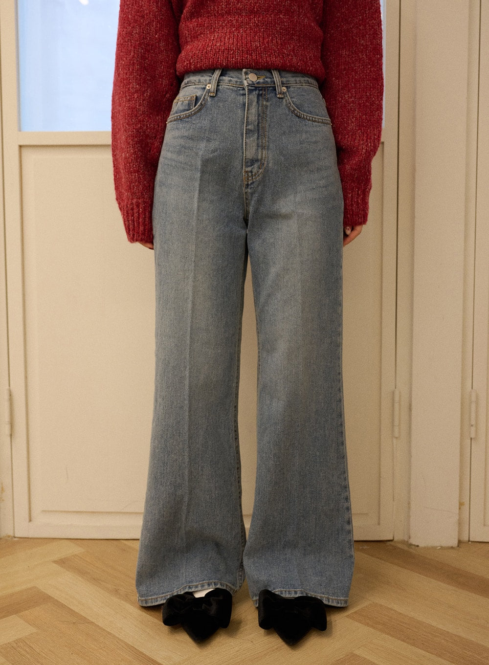 Casual Denim Solid Straight Leg Jeans OD326 in blue, front waist-to-hem close-up on model, high-rise button fly, slim-fit washed cotton denim with wide straight leg, paired with red sweater.