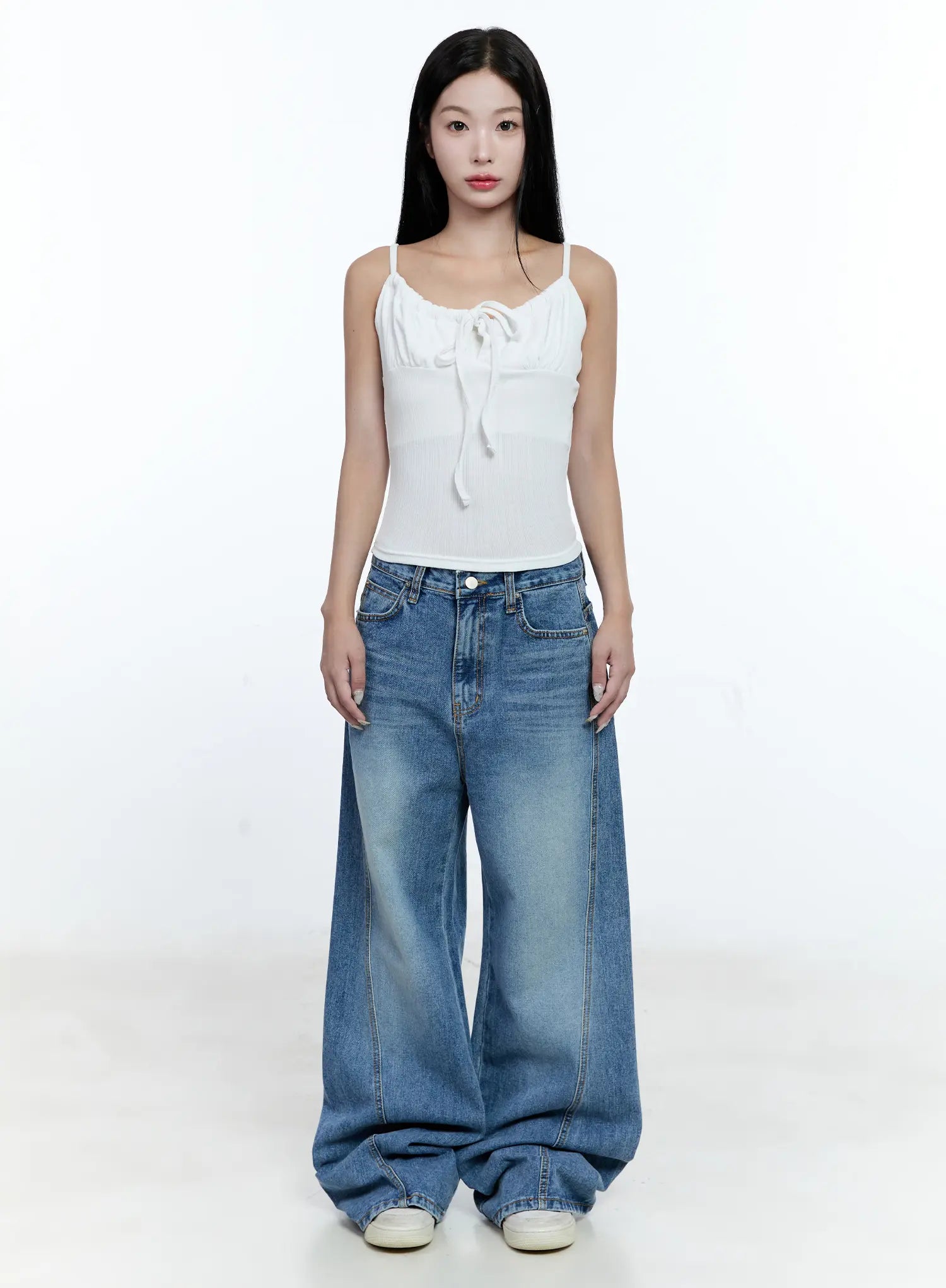 Ana Wide-Leg Denim Jeans CG507 in blue, full-length front view on model, washed wide-fit denim paired with white ribbed tie-front cami top, floor-grazing hem.