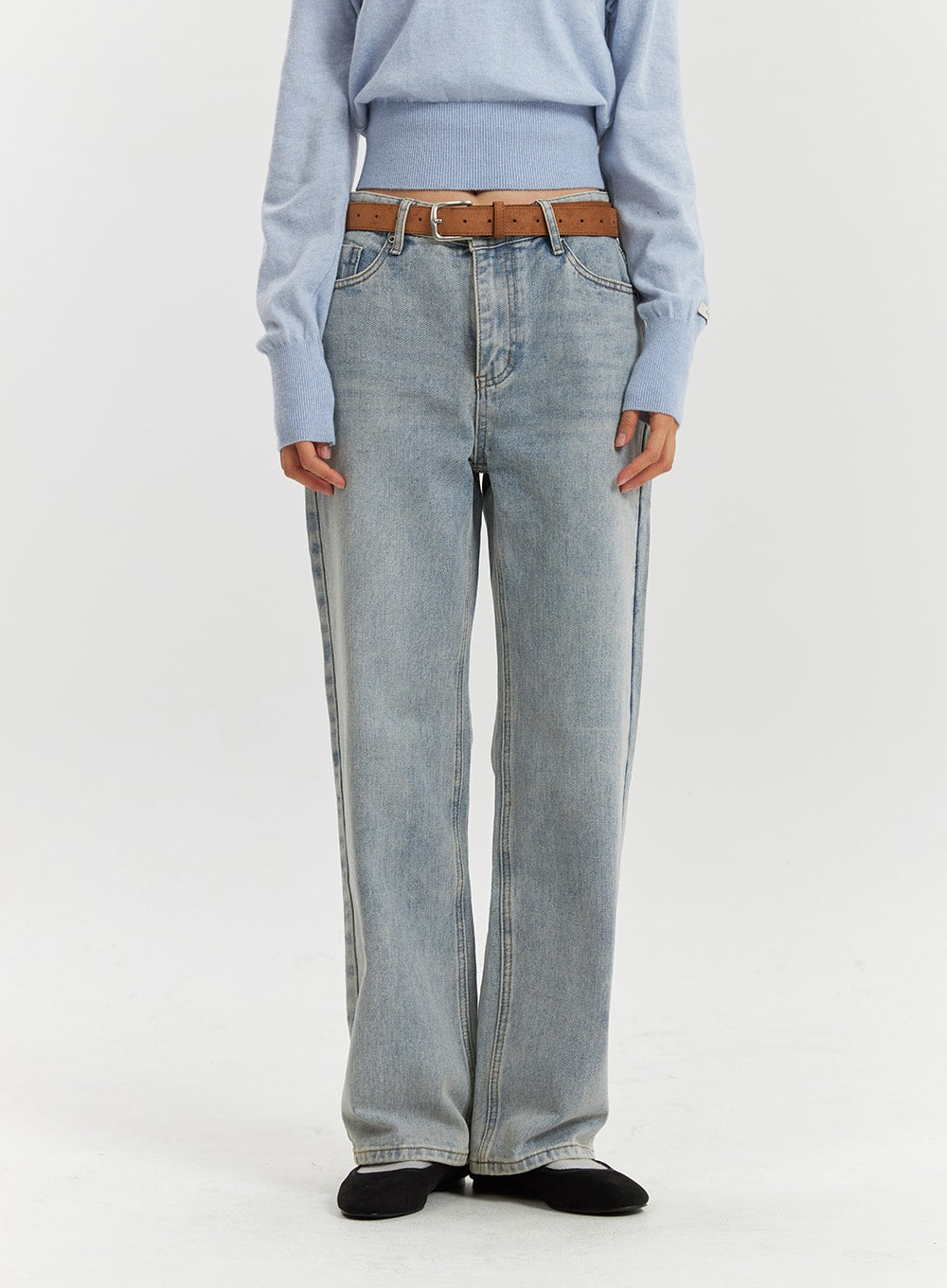 High-Waisted Full-Length Straight Leg Jeans OD320 in light blue, waist-to-hem front close-up on model, high-rise waistband with tan leather belt, straight washed denim leg.