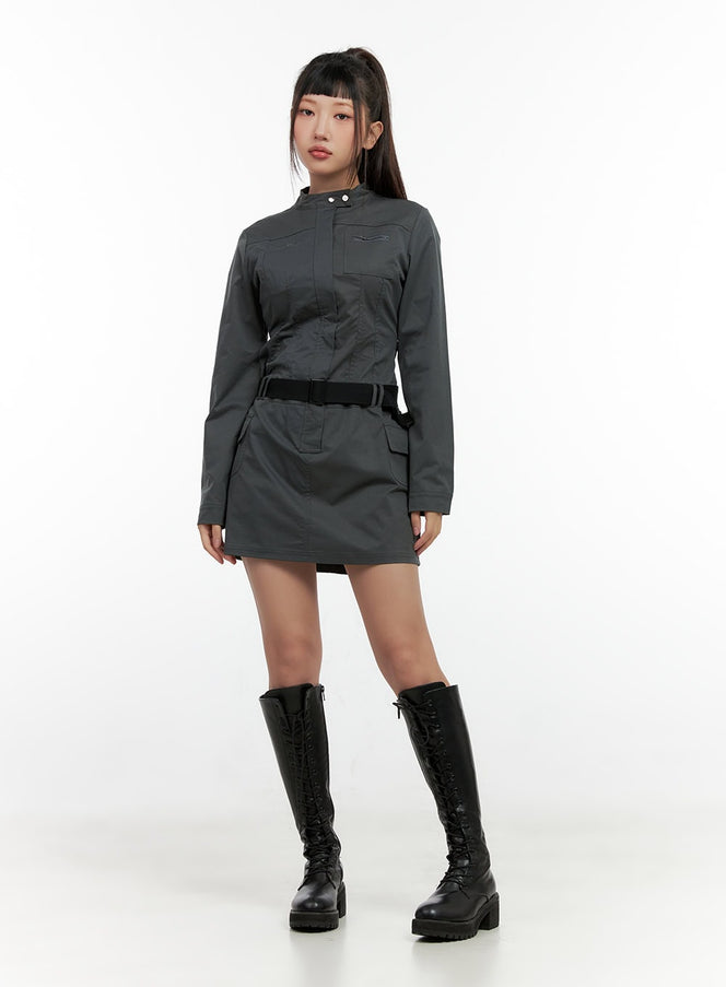 Half Zip Up Belt Mini Dress CN404 in gray, full-length front shot on model, long sleeve mini dress with black buckle belt, styled with tall black lace-up combat boots.