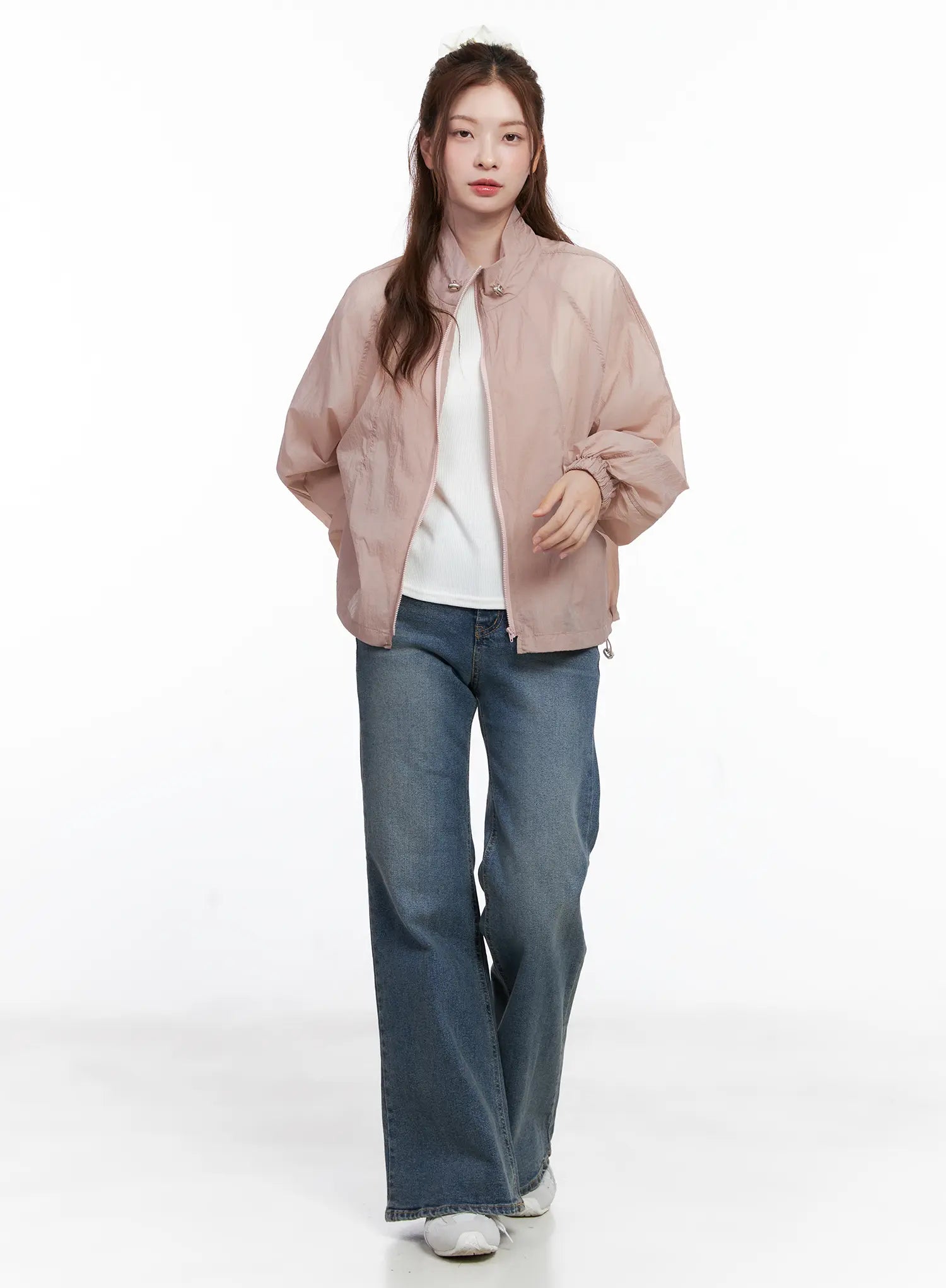 Juae High Waist Flare Jeans CG520 in blue, full-body front on model, long flare leg, styled with pink windbreaker jacket and white tee.