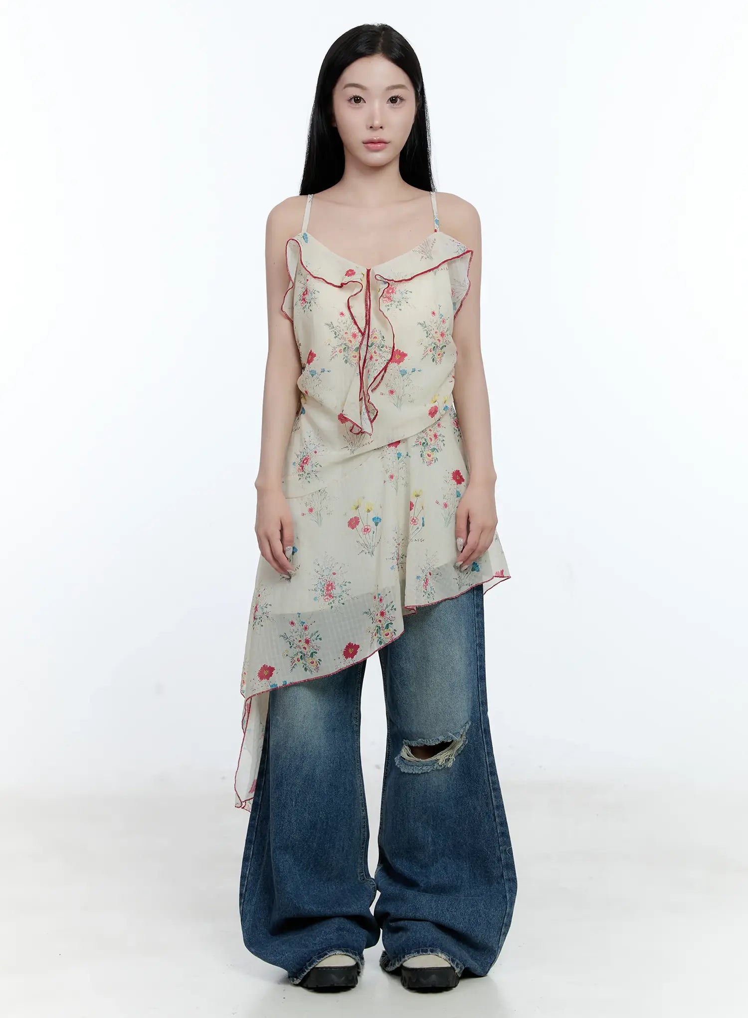 Gabi Distressed Semi-Flared Denim Jeans CG501 in dark blue, full front outfit shot, styled with floral asymmetric cami top, wide washed leg and knee distressing visible.