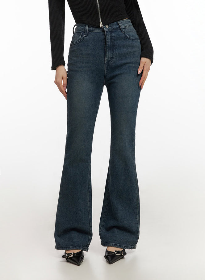 Gabriella Slim-Fit Bootcut Jeans ID431 in dark blue, front cropped shot on model from waist to ankle, high-rise waistband with button fly, slim through thigh flaring to bootcut hem, washed denim texture.