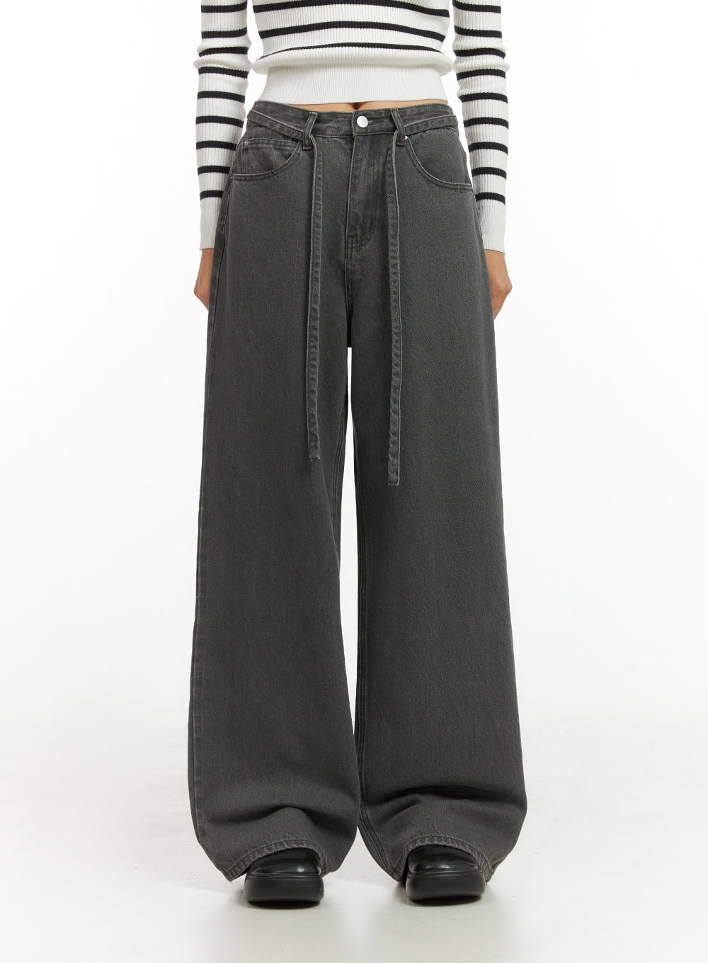 LEWKIN Emery Cotton Strap Baggy Jeans IO409 in dark gray, front view on model, wide-leg straight fit cotton denim with dangling strap detail, paired with striped crop knit top.