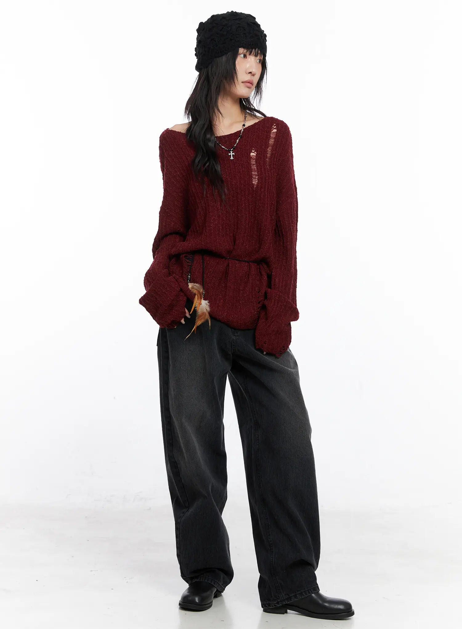 Ivey Washed Baggy Jeans CC1809 in black, full-body front editorial shot on model, wide-fit washed denim styled with burgundy distressed knit sweater and black beanie.