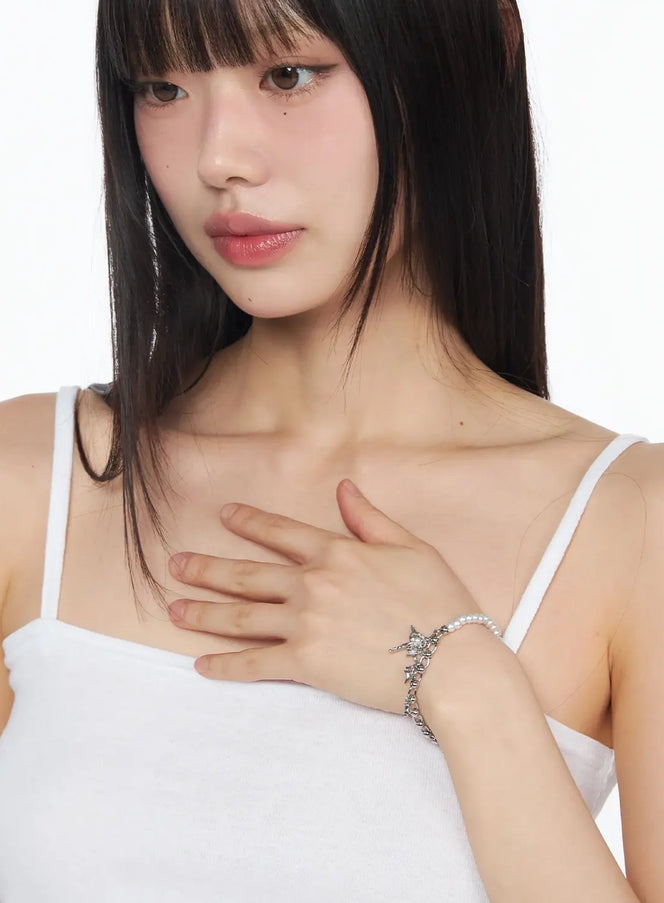 pearl-cross-charm-bracelet-iy520