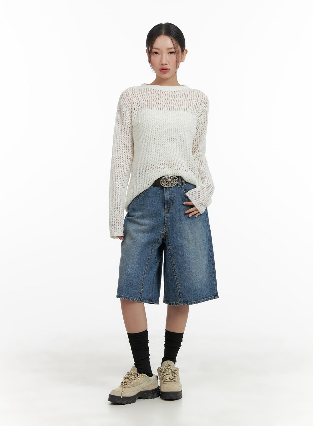 Vintage Washed Wide Leg Jorts CA415 in blue, full-body front shot on model, wide-leg knee-length denim jorts with washed finish, paired with open-knit cream sweater and brown belt.