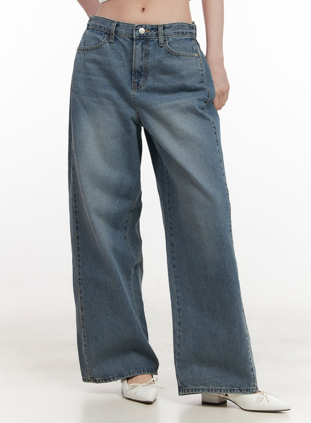 LEWKIN Andrea Wide-Leg Jeans CF514 in blue, front three-quarter product shot on model, washed cotton denim, pintuck detail, wide-fit leg, paired with white ballet flats.