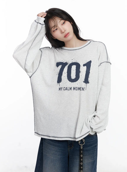 graphic-oversized-textured-long-sleeve-top-cj527