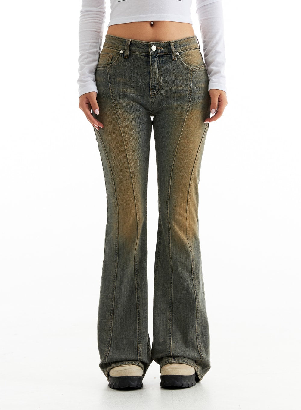 Stitched Bootcut Jeans CO313 in Blue, front close-up on model from waist down, low-rise with curved stitch seams and amber washed tones on cotton-spandex denim.