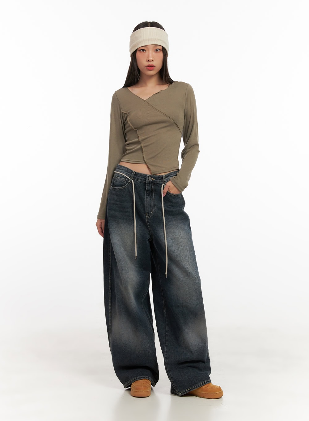 Vivian Washed Cotton Baggy Jeans CD409 in dark blue, full-body front shot on model, ultra-wide baggy silhouette styled with olive wrap crop top and cream headband.