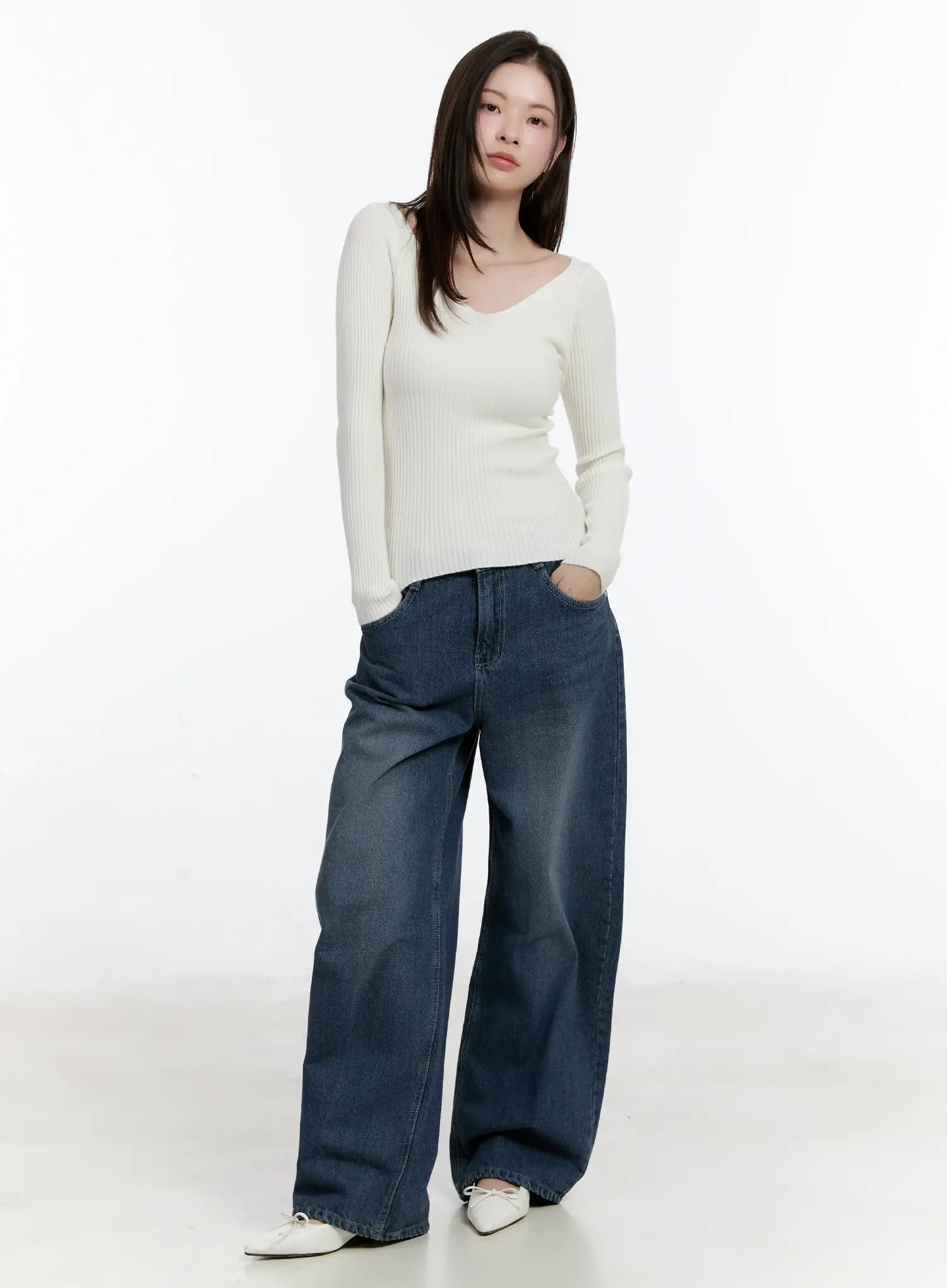 Della Casual Denim Wide Jeans ID511 in blue, full-body front shot on model, wide-fit washed denim, long length, paired with cream ribbed knit top and white ballet flats.