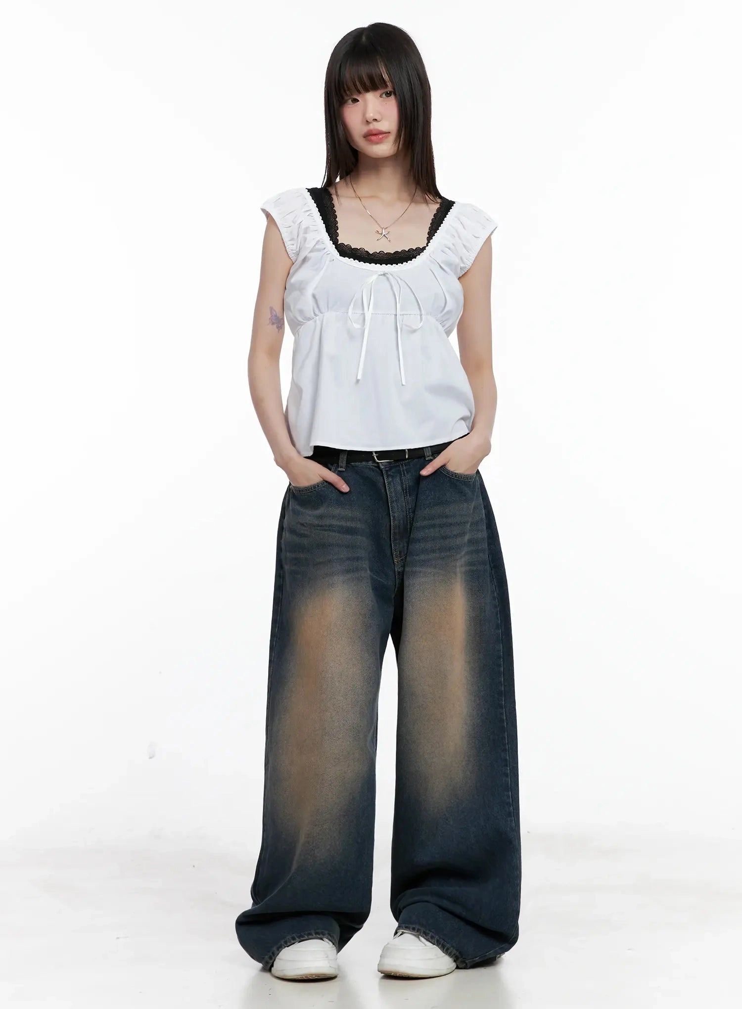 Solji Acid Washed Wide-Leg Jeans IL531 in dark blue, full-body front shot on model, paired with white ruffle lace camisole top and white sneakers, casual street look.