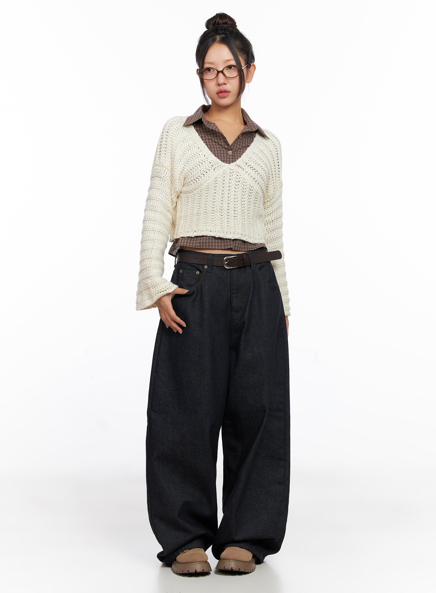 Miller Balloon Baggy Jeans CO515 in dark blue, full outfit front view on model, styled with cream knit sweater, plaid shirt, brown belt, and beige chunky boots.