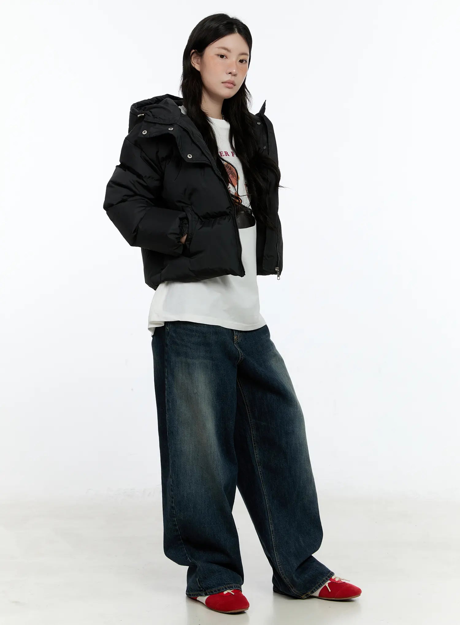 Hunter Washed Wide Leg Jeans CN517 in dark blue, 3/4 angle full-body on model, styled with black cropped puffer jacket and white graphic tee, red flat shoes.