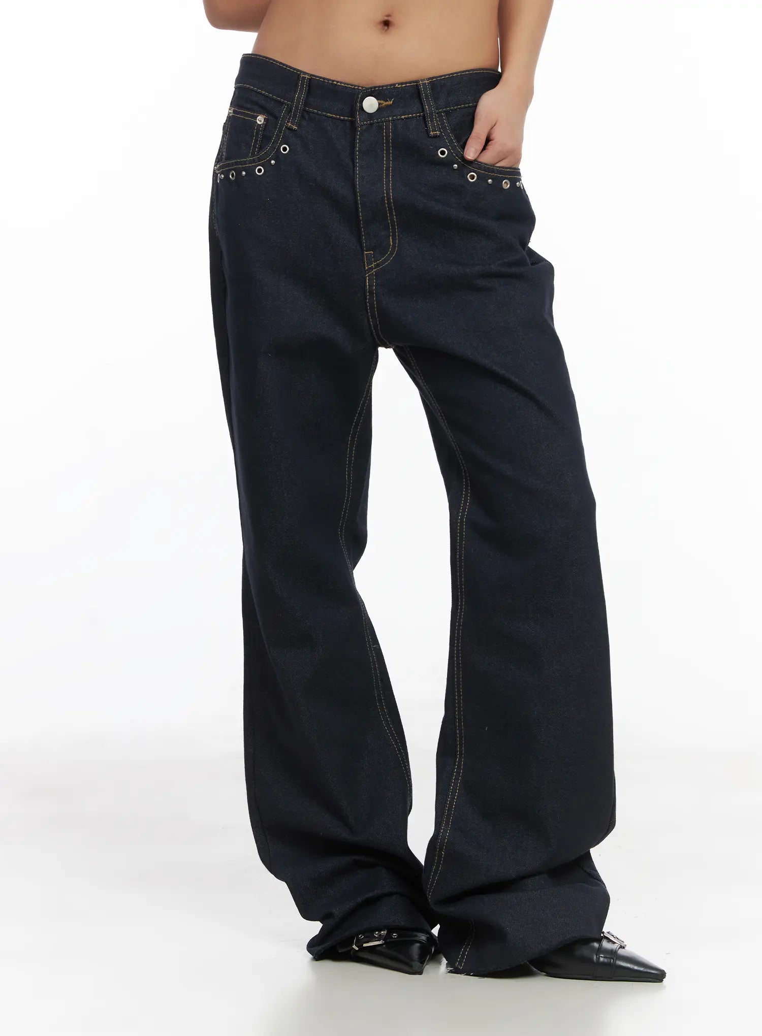 Bunn Non-Fade Eyelet Bootcut Jeans CJ512 in dark blue, front three-quarter product shot on model, eyelet-detailed pockets, contrast topstitching, low-rise wide fit with bootcut hem.
