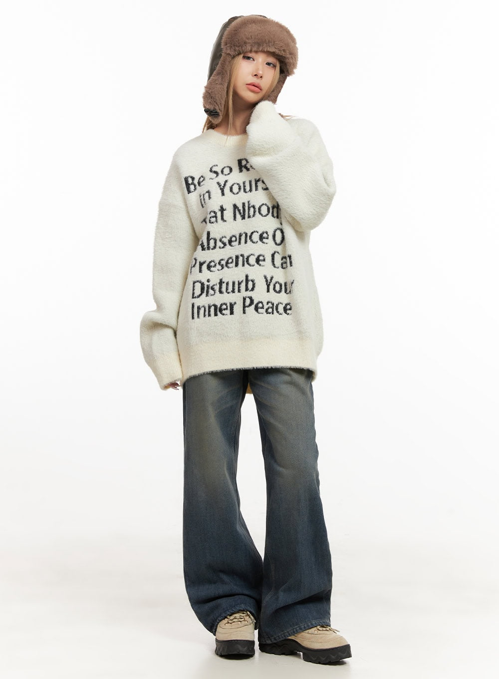 Michelle Washed Wide-Leg Jeans CJ508 in blue, full-body front shot on model, wide-fit washed denim pooling at hem, styled with cream letter-print sweater and fur trapper hat.