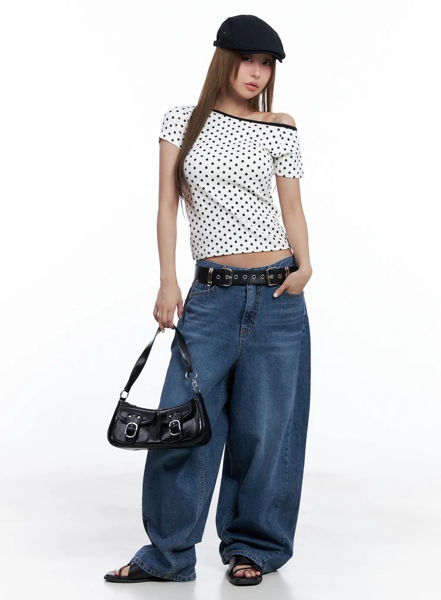 Shuhua Washed Wide-Leg Denim Jeans CL510 in dark blue, full-length front outfit shot, styled with polka-dot crop top, black belt, baker boy cap, and mini shoulder bag.
