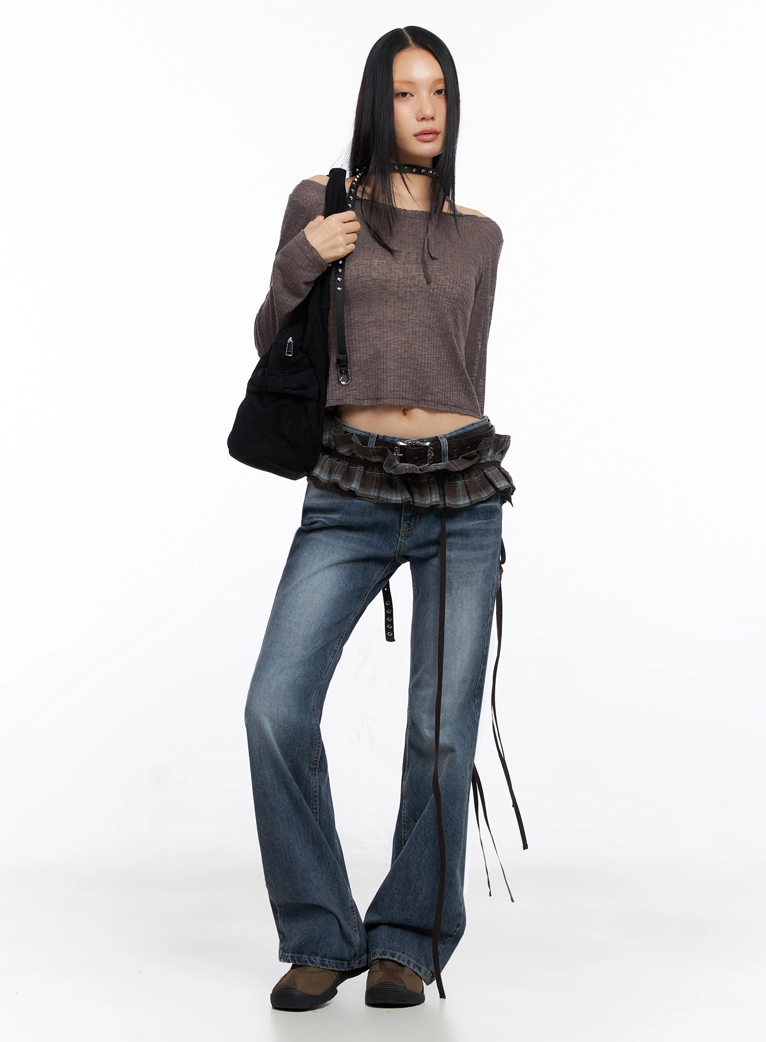 Myra Washed Bootcut Jeans IO516 in dark blue, full-body front on model, styled with brown crop knit top, plaid mini skirt belt, choker, and black tote bag, casual Y2K look.