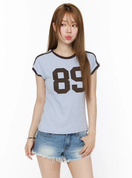 89-graphic-raglan-short-sleeve-top-cu511 / Light blue