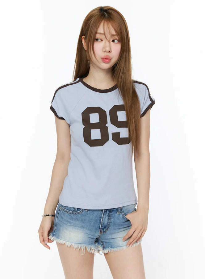 89-graphic-raglan-short-sleeve-top-cu511 / Light blue
