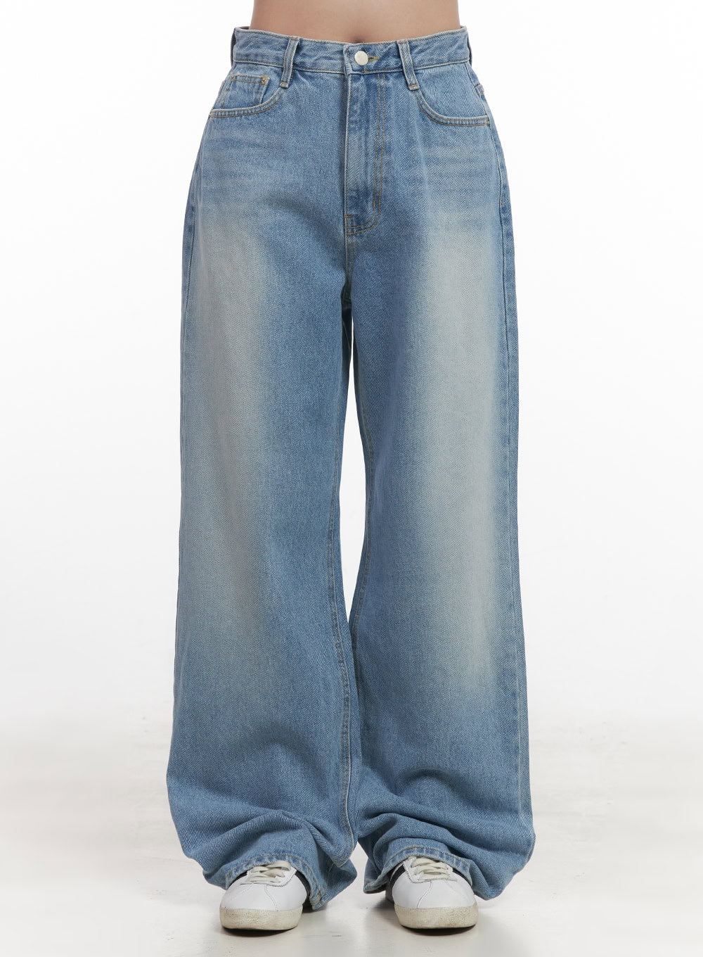 LEWKIN Kelly Washed Baggy Jeans CJ514 in light blue, front product shot on model, wide-fit washed cotton denim with faded whiskering, high waist, styled with white sneakers.