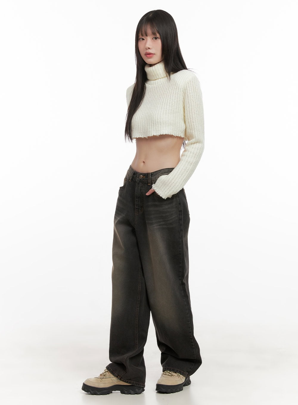 Celina Washed Baggy Wide-Leg Jeans CD426 in black, three-quarter front angle on model, low-rise washed denim with baggy wide leg, paired with ivory ribbed turtleneck crop top and chunky boots.