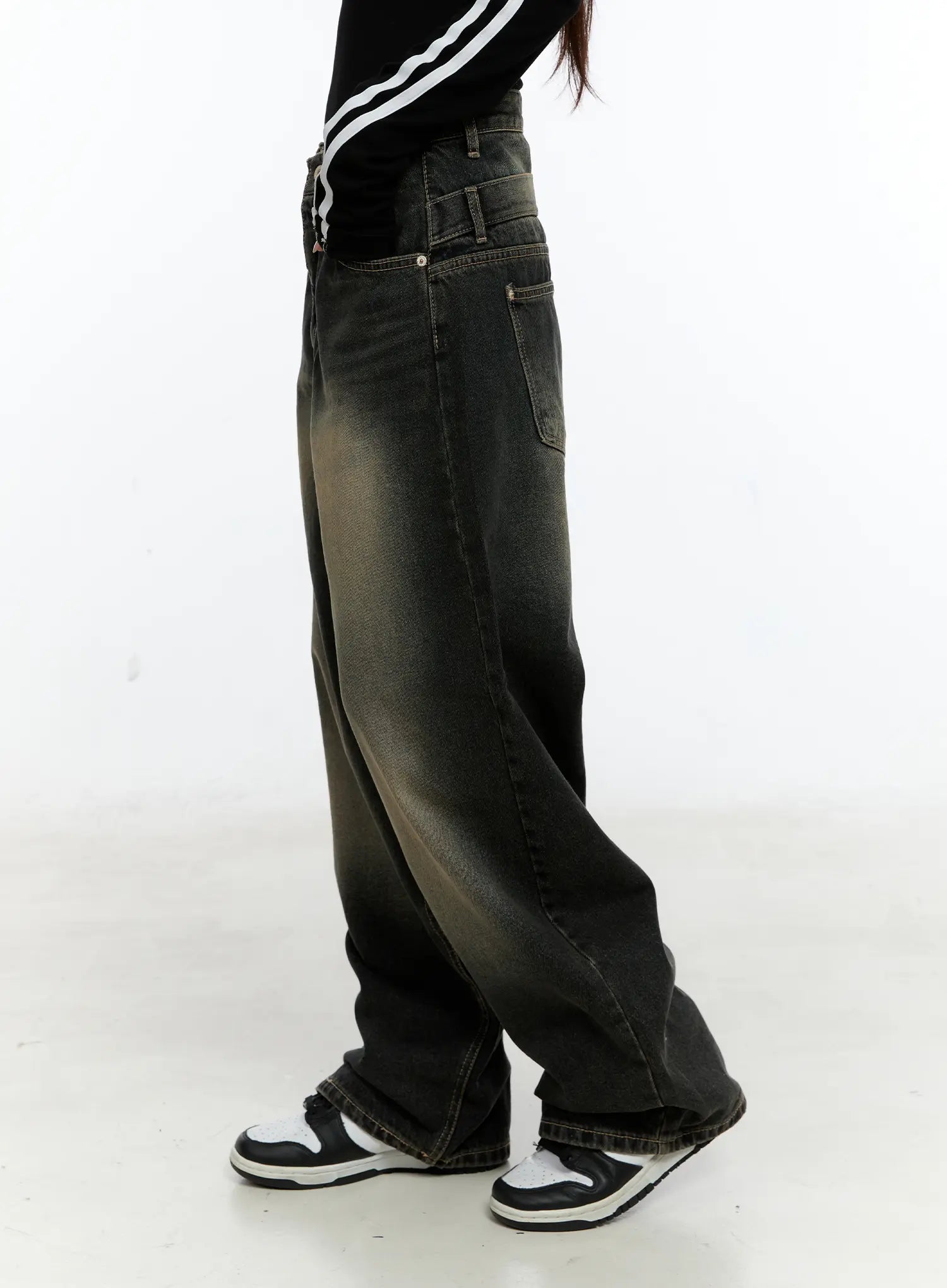 Emerie Washed Wide-Leg Baggy Jeans CS518 in dark blue, side view on model, showing extreme wide-leg volume and washed gradient from dark hem to golden-toned thigh, with side pocket detail.