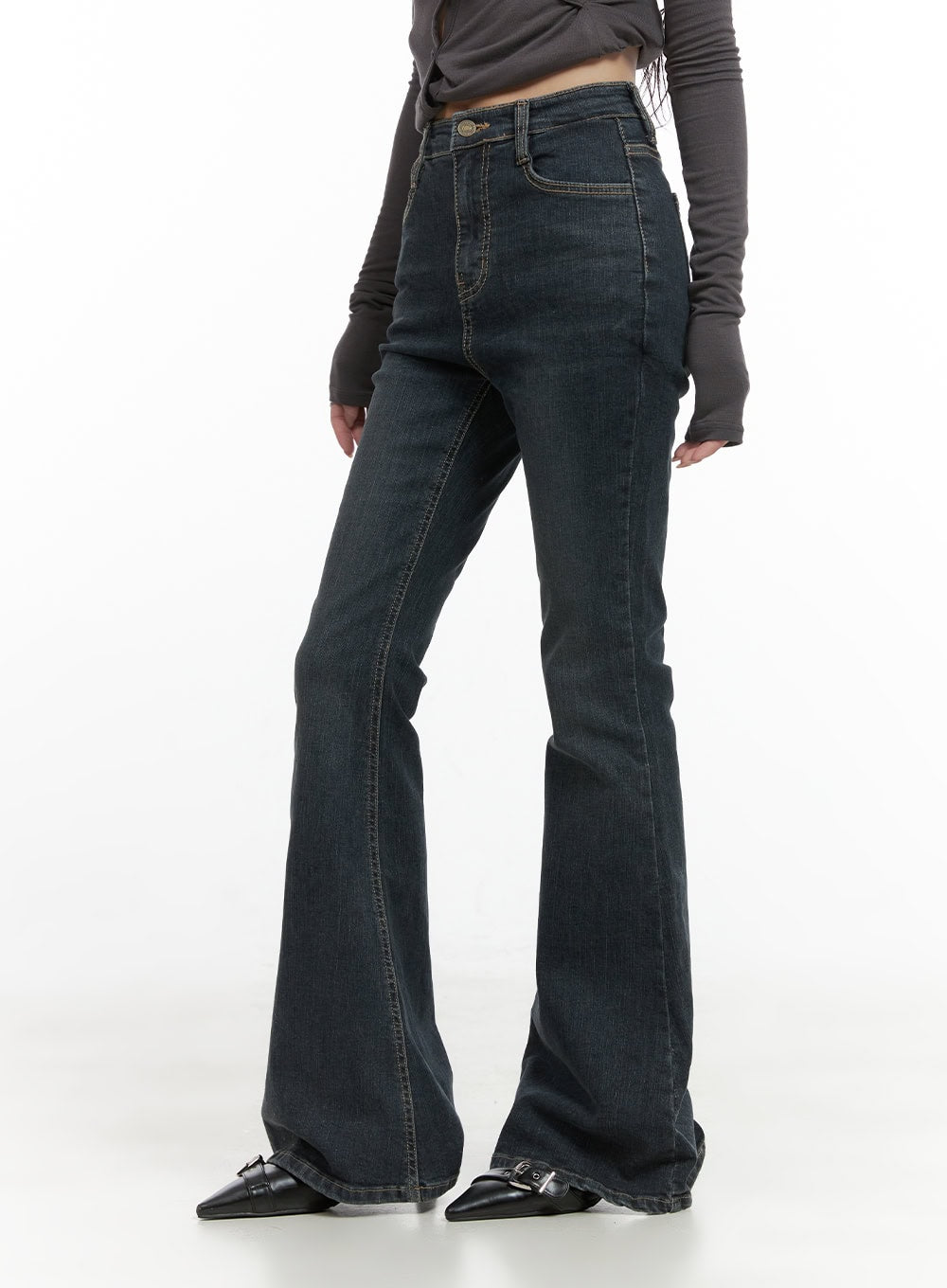 Zadie Slim Washed Denim Bootcut Jeans CG421 in dark blue, side view on model, highlighting slim thigh-to-flare bootcut shape, high-rise waistband with contrast stitching, paired with grey crop top.