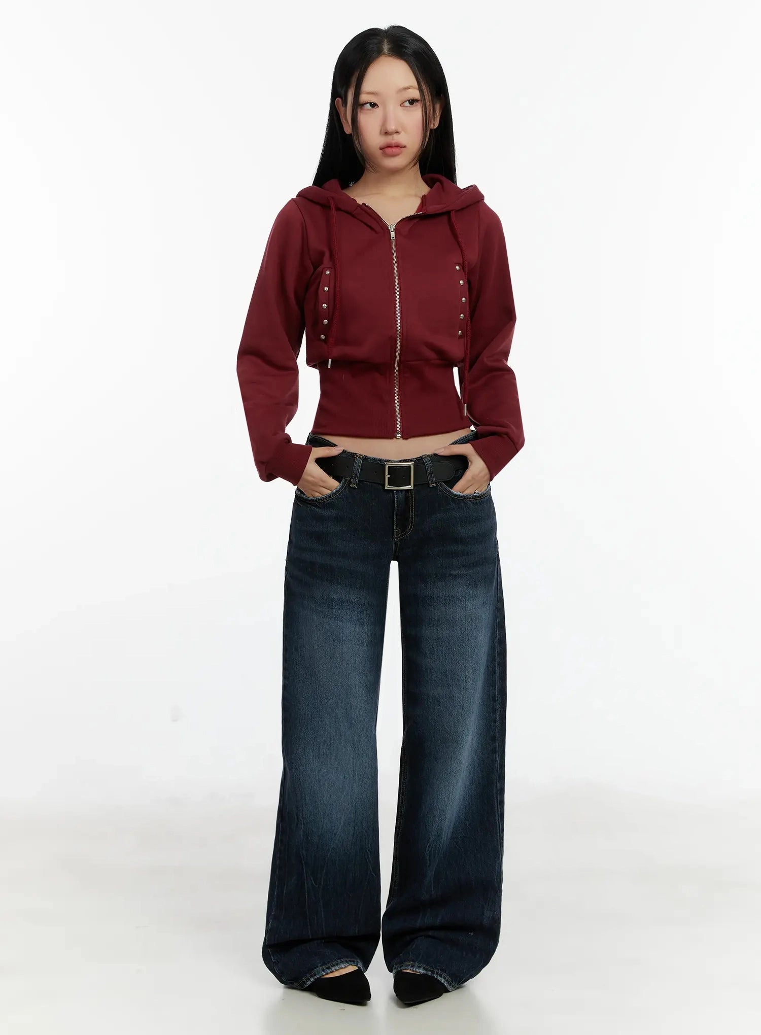 Aimee Low Rise Wide Leg Jeans ID525 in dark blue wash, front full-body shot on model, wide straight leg silhouette, low-rise fit, paired with cropped burgundy hoodie and black belt.