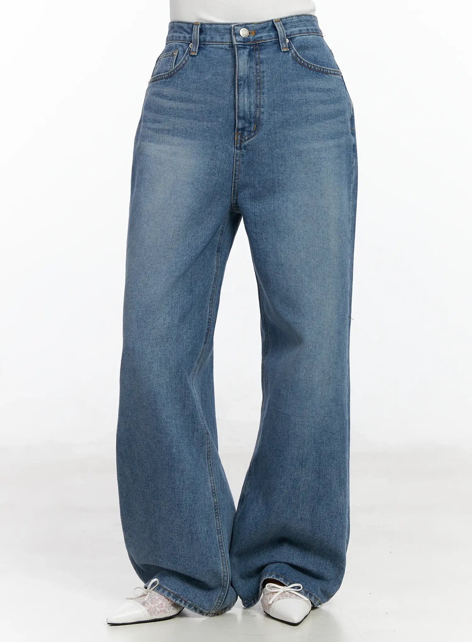 Ensley Wide Leg Jeans IJ529 in blue, front mid-shot on model, washed cotton high-waist wide leg silhouette, five-pocket construction, floor-grazing long length.