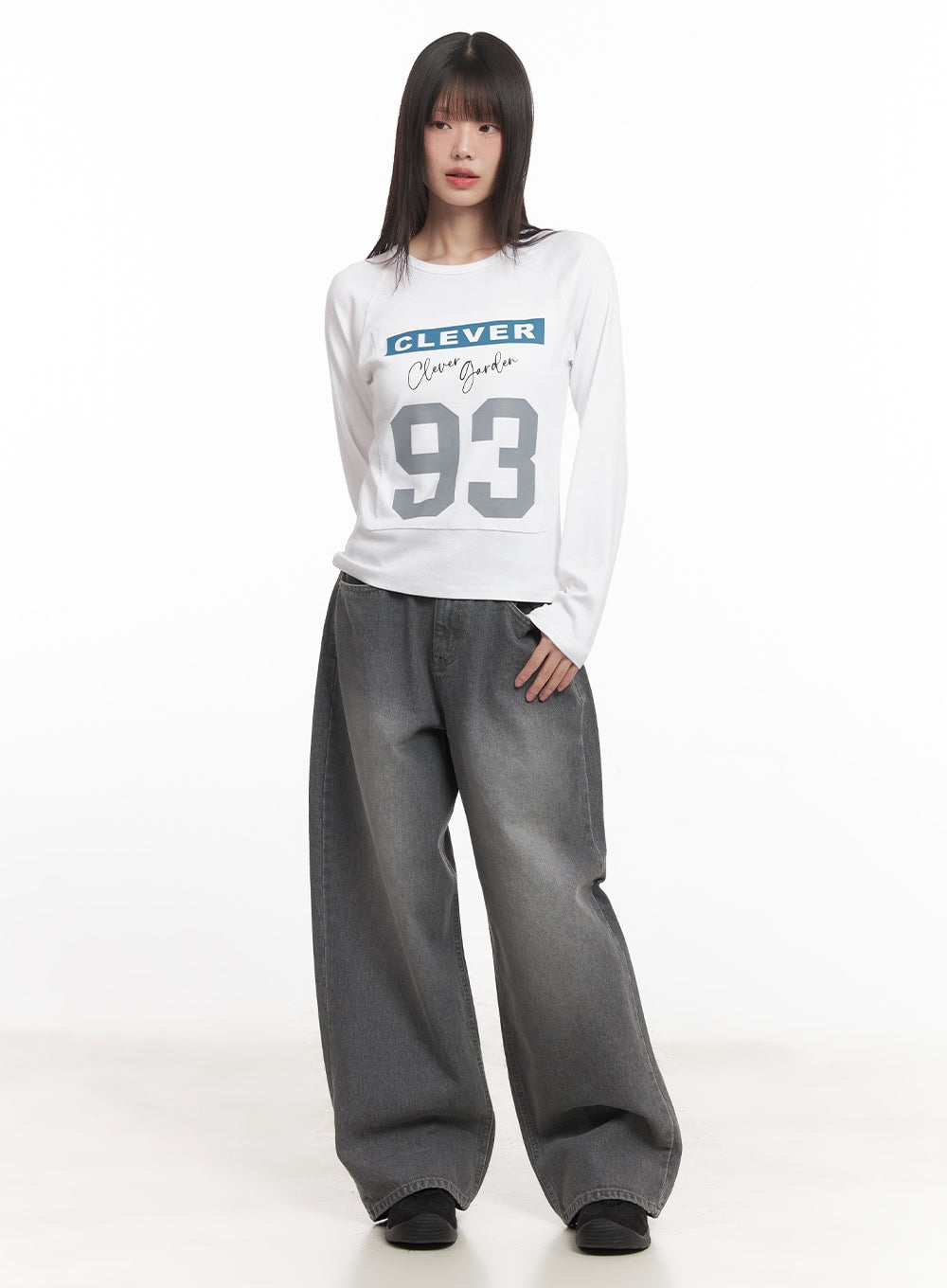 Venessa Washed Baggy Jeans CM528 in dark gray, front full-length on model, ultra-wide washed denim leg, paired with white graphic long-sleeve top, street style look.