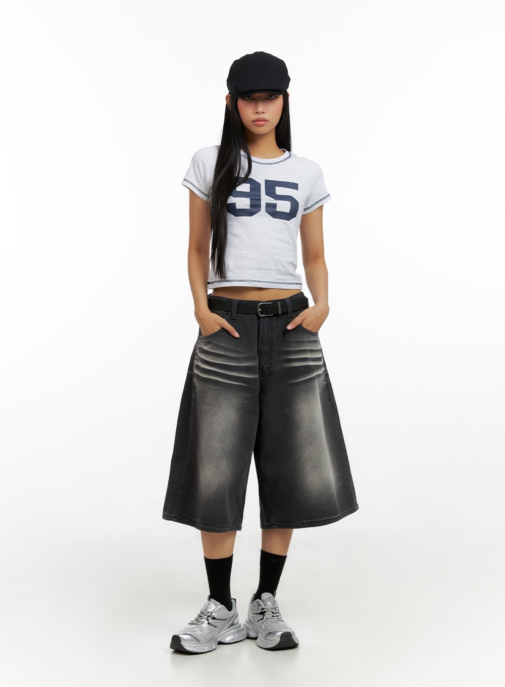 Washed Baggy Jorts IL419 in black, front full-body on model, wide-leg midi cotton denim, belted waist with faded wash, paired with graphic crop tee and black socks.