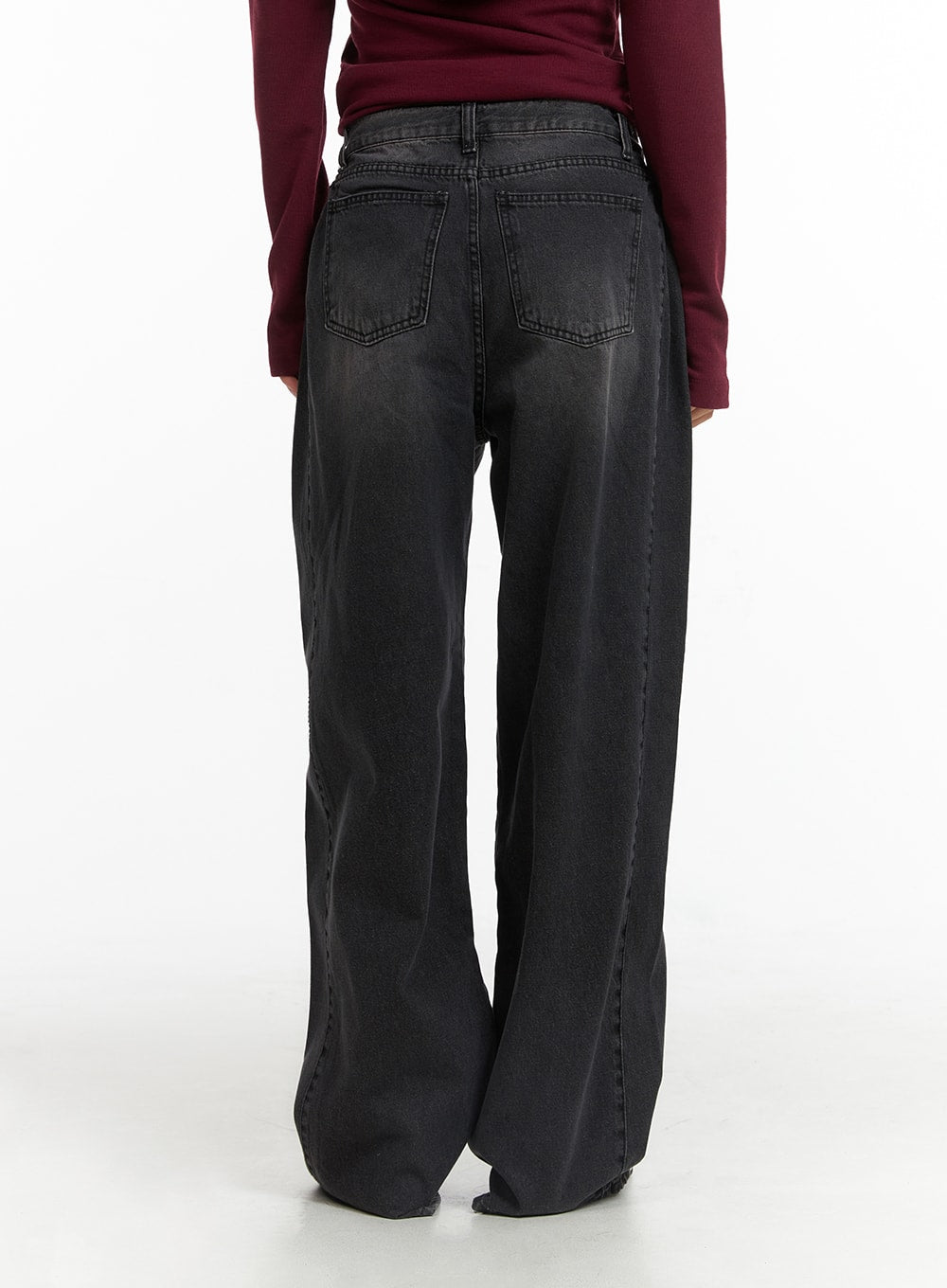 Washed Denim Wide-Leg Jeans CJ426 in black, back view on model cropped at waist, dual back pockets with stitching detail, washed cotton denim wide-leg, paired with burgundy top.