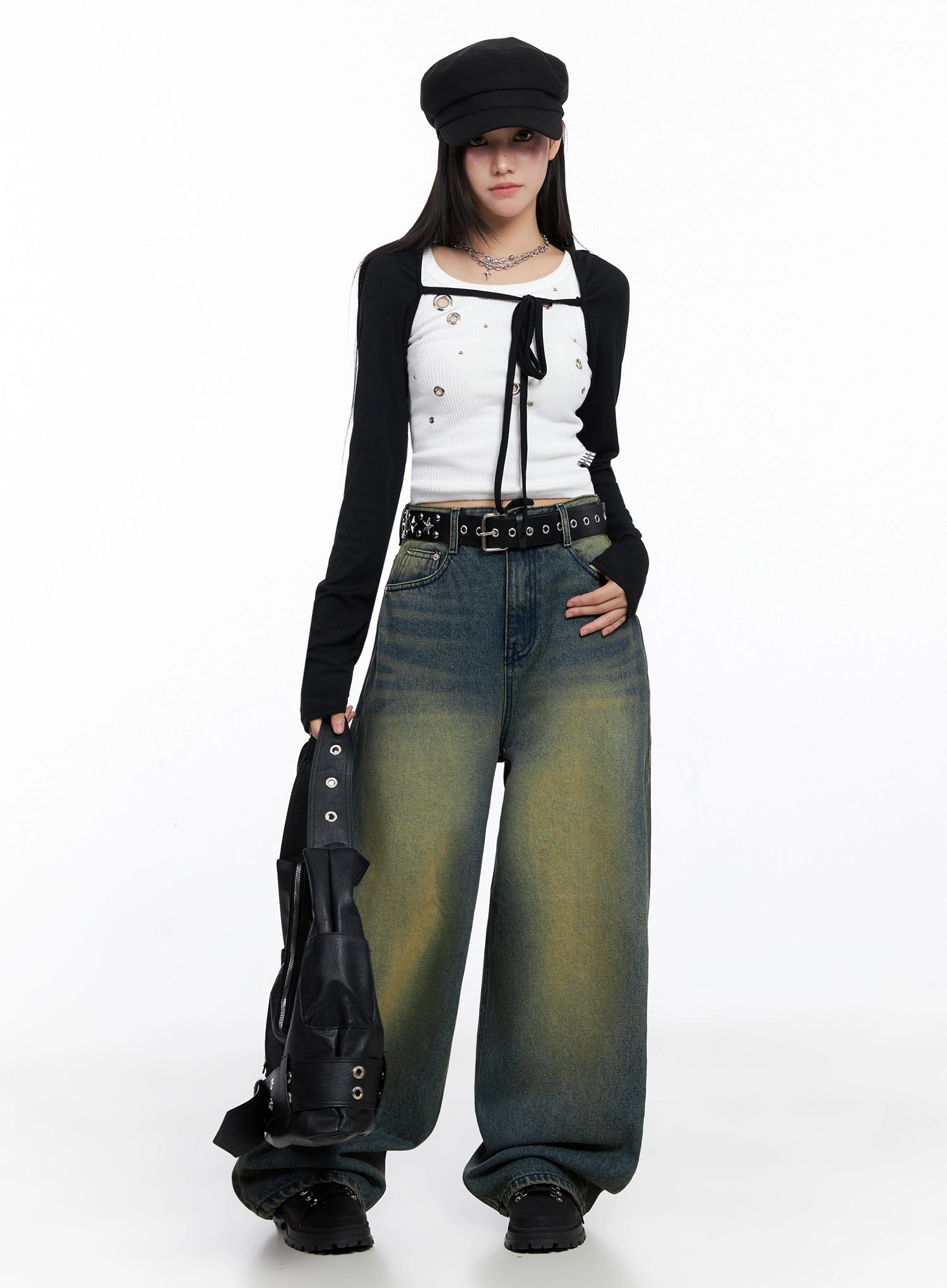 Elora Washed Baggy Jeans IS525 in dark blue, full-body front shot on model, yellow-green washed wide-leg denim paired with black bolero, studded belt, and leather bag.