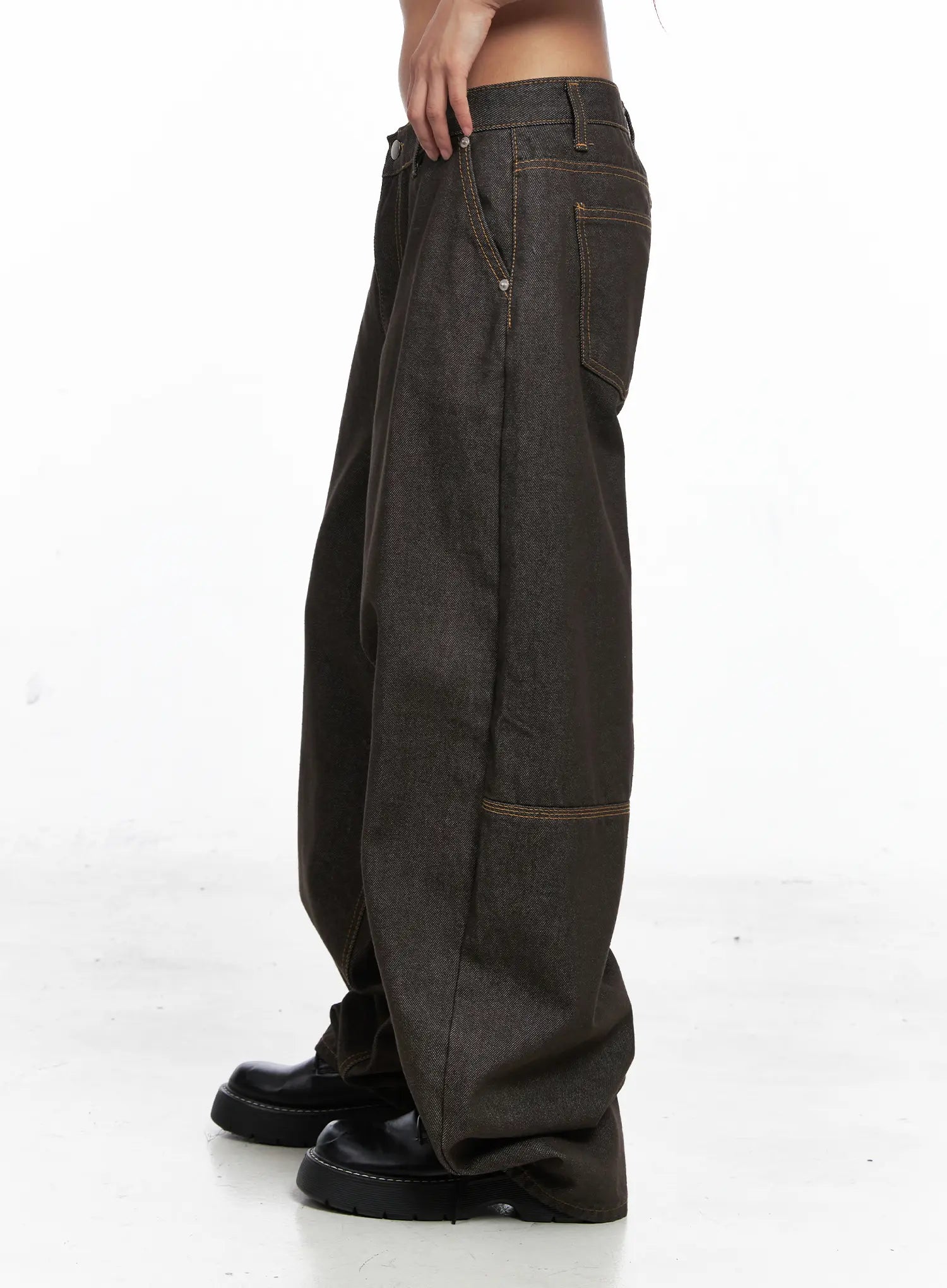 Oaklyn Non-Fade Wide-Leg Jeans CO513 in dark brown, side view on model, low-rise waistband with contrast stitching, utility carpenter loop on thigh, voluminous wide leg pooling at ankle.