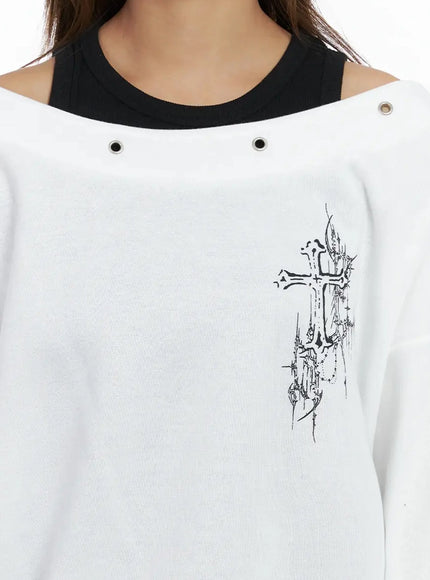 off-shoulder-eyelet-graphic-sweater-in528