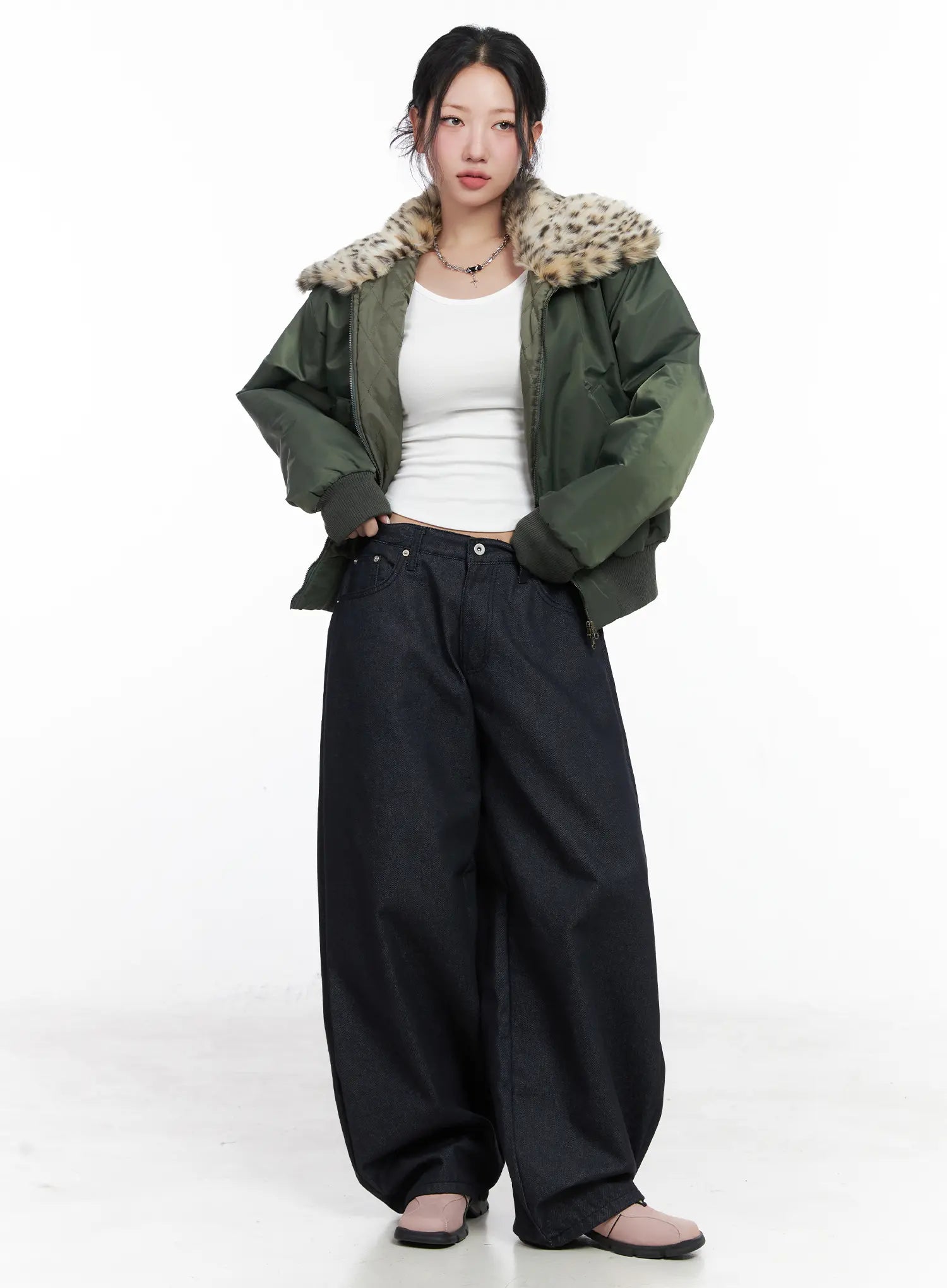 Solana Unwashed Wide-Leg Jeans CN514 in dark indigo, full-body front on model, voluminous wide-leg denim, paired with green fur-collar bomber jacket and white tank top.