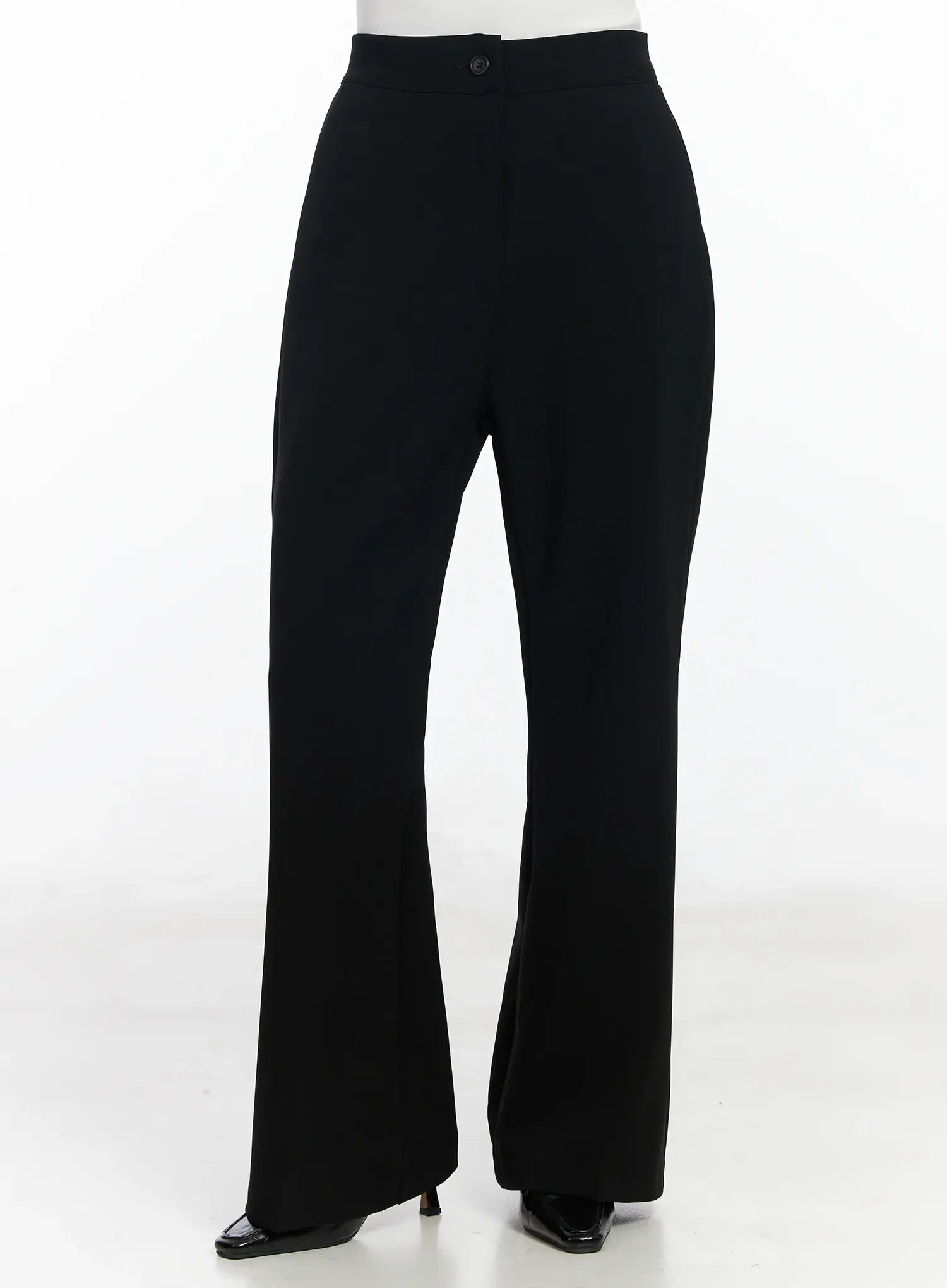 Hip Pad Slacks IJ529 in black, straight-on front mannequin shot, bootcut flare from knee, high waistband with button detail, clean solid fabric.