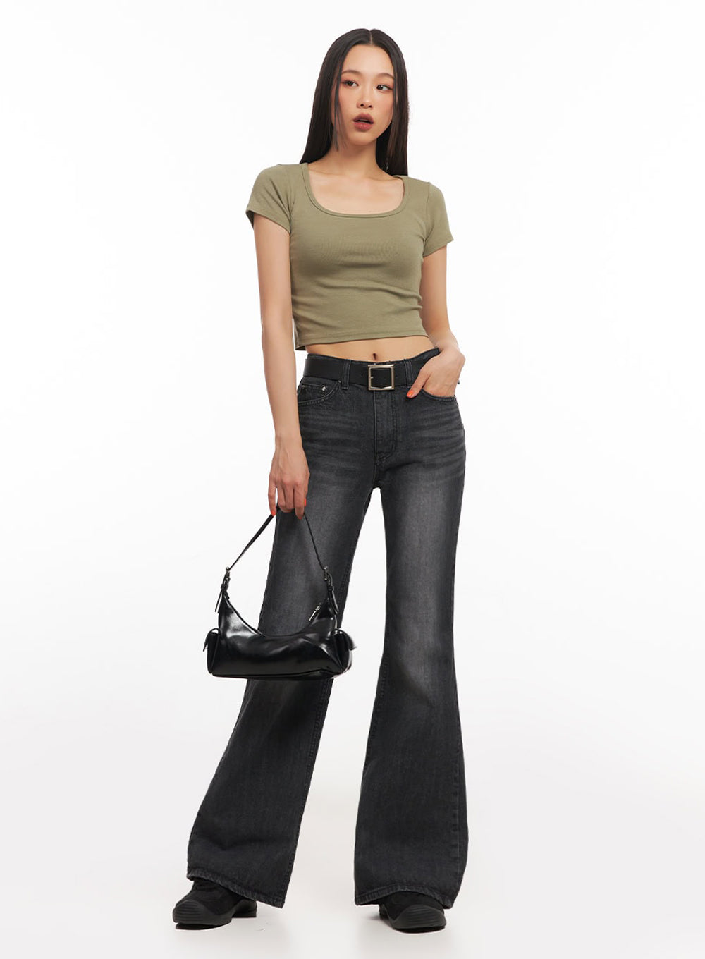 Joanna Washed Flared Jeans IA504 in washed black, full-body front on model standing straight, high-rise slim bootcut silhouette, black belt, styled with olive crop top and black mini bag.