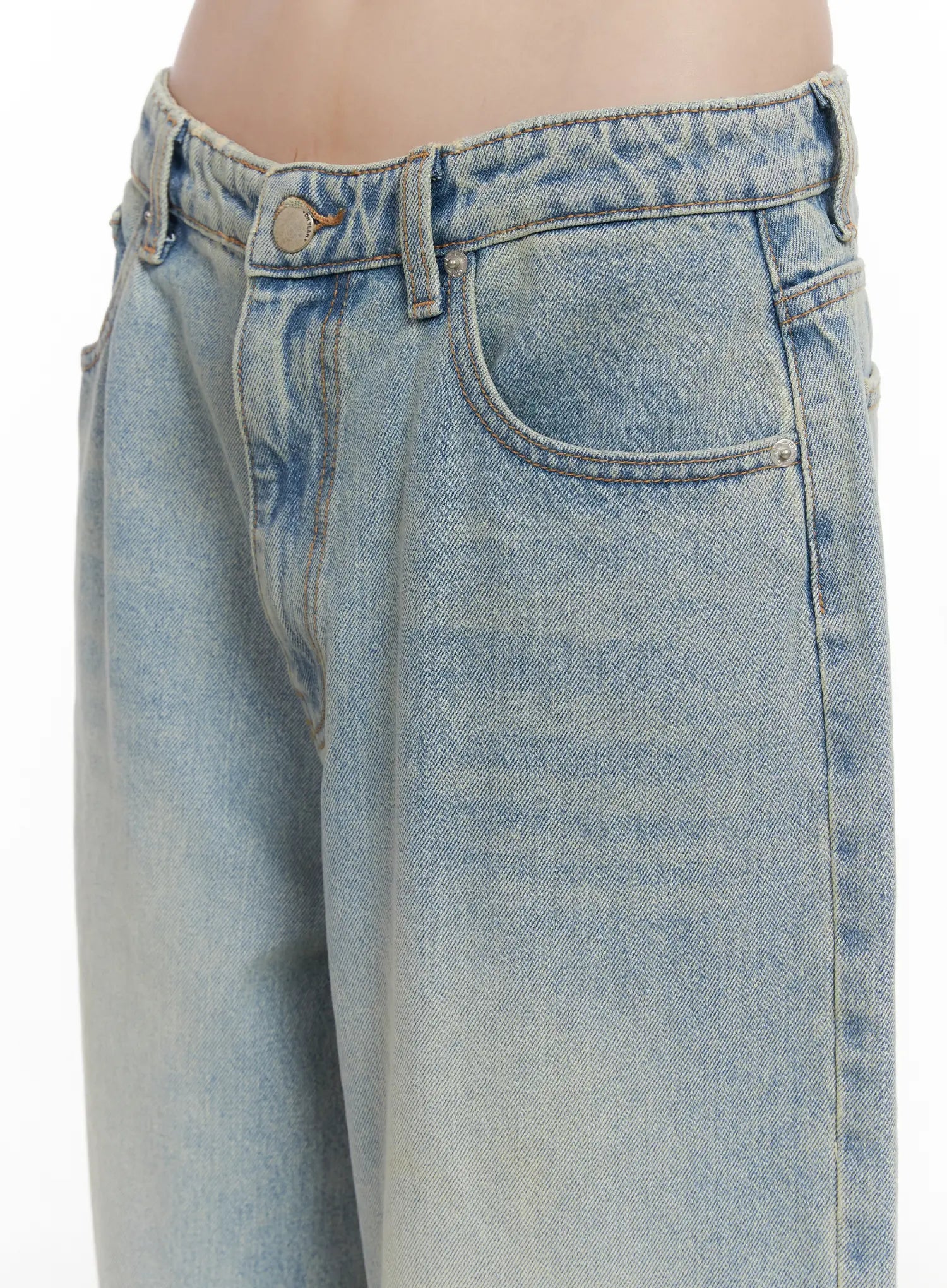 Lilly Light Wash Baggy Jeans CG519 in light blue, close-up of waistband and front pocket detail, washed cotton denim with coin pocket and contrast stitching visible.