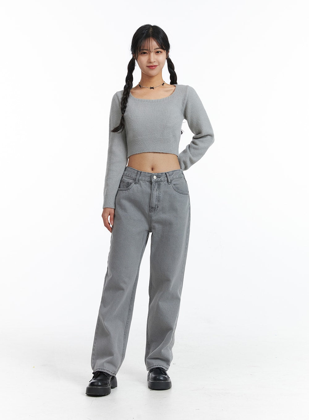 Low-Rise Straight Leg Jeans OJ426 in gray, front full-length shot on model standing straight, wide-fit washed cotton denim, paired with gray crop knit and black loafers.