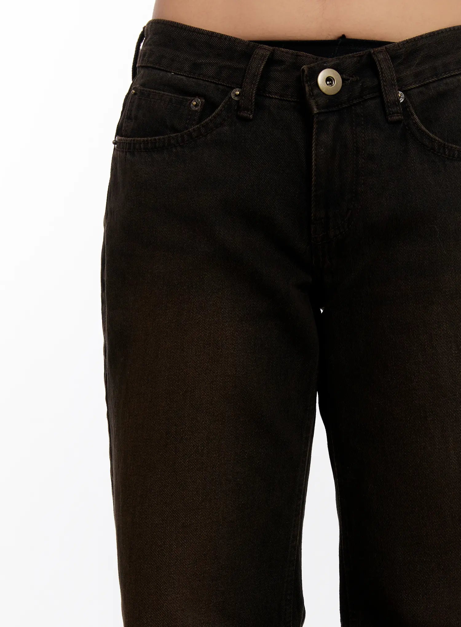 Mael Low Rise Straight Jeans CN527 in black, close-up detail of low-rise waistband, V-cut front rise, front pockets with rivets, and metal button closure on worn model.