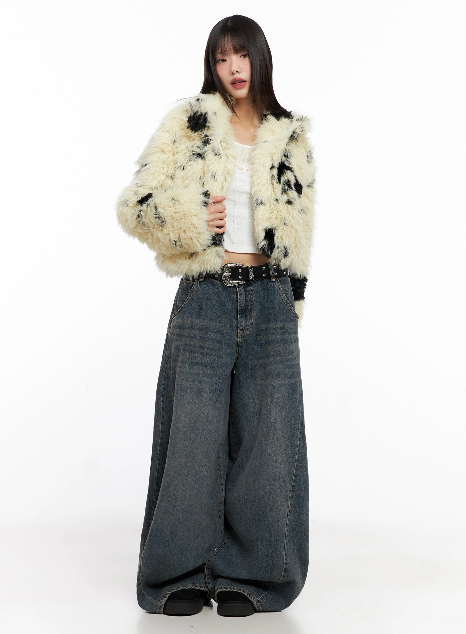 Skyler Washed Balloon Fit Jeans IN503 in blue, full-body front shot, model styled with spotted faux-fur jacket and leather belt, voluminous balloon-leg cotton denim, long length.