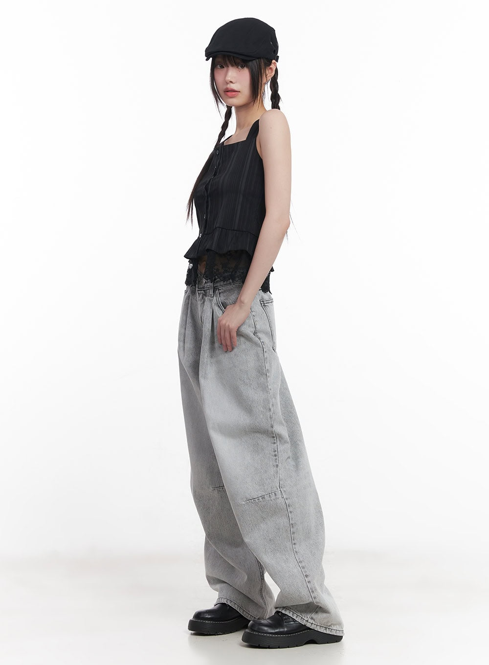 Melisa Washed Wide-Fit Jeans CU506 in gray, side view on model in black lace cami and newsboy cap, showing extra-wide leg silhouette and panel seam detail, acubi street style.