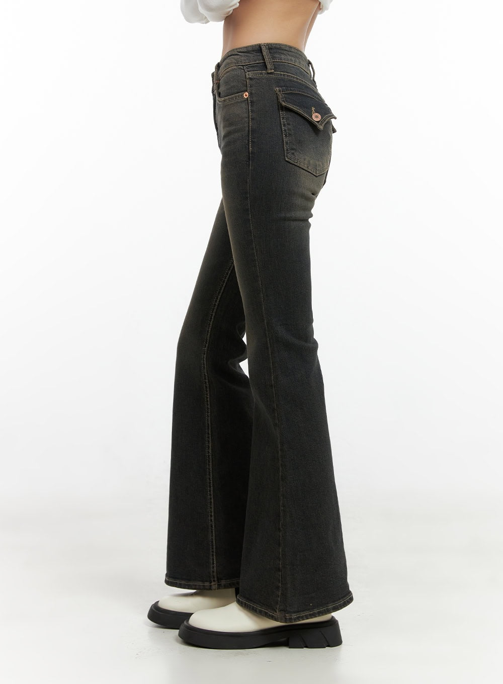 Paisley Slim-Fit Bootcut Washed Jeans CO424 in dark blue, close-up side view on model, low-rise waist with belt loops, decorative flap pocket with rose-gold button, subtle flare at hem.