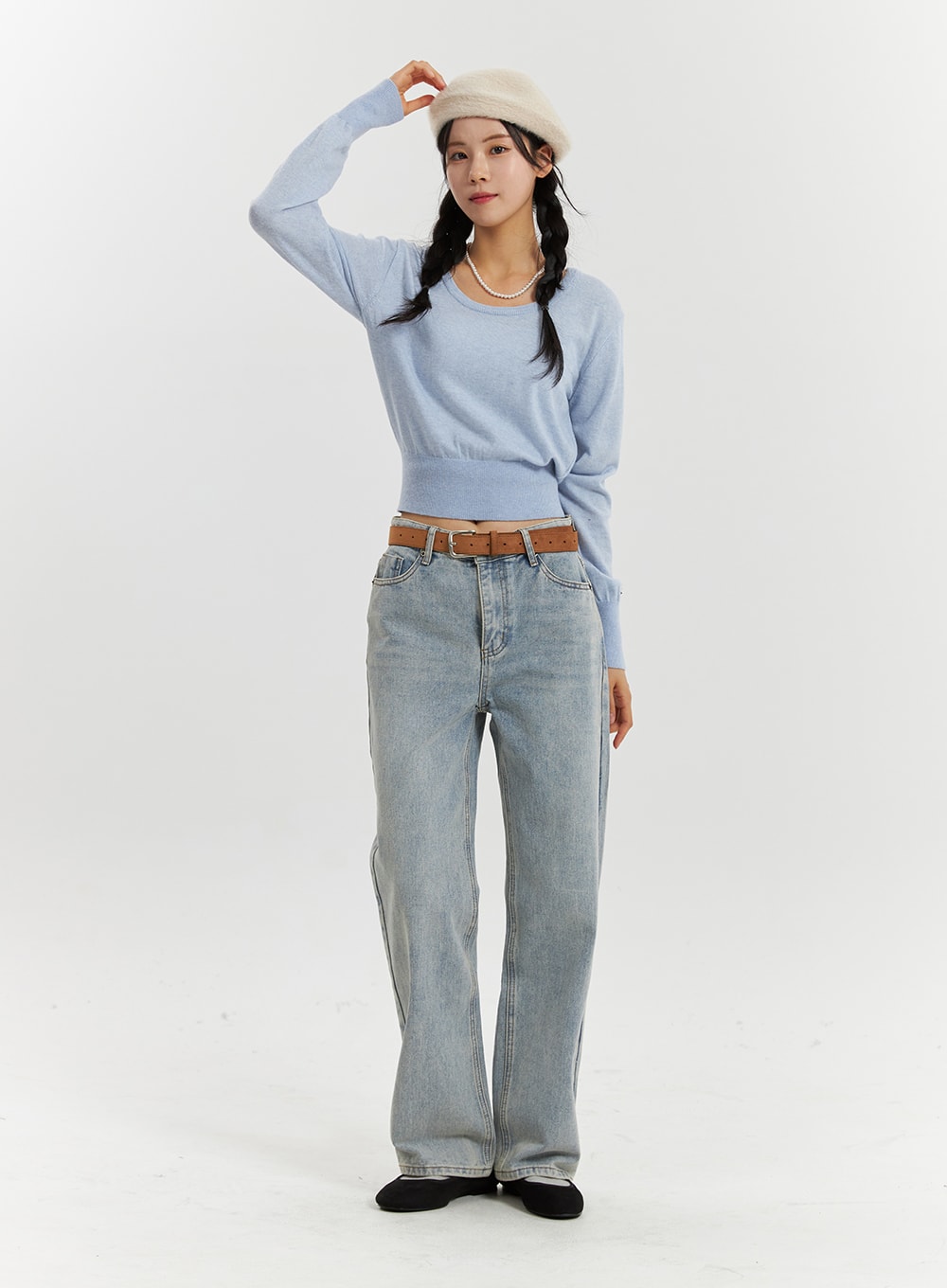 High-Waisted Full-Length Straight Leg Jeans OD320 in light blue, full-body three-quarter angle on model touching beret, straight-leg washed denim, styled with blue crop knit.