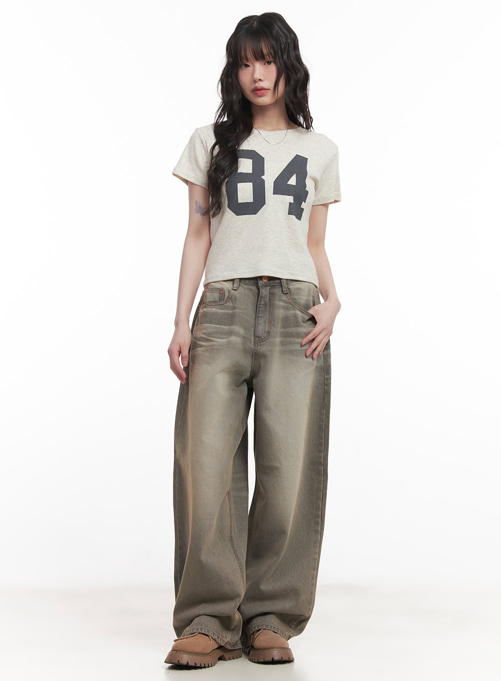 Joey Washed Wide-Leg Jeans CM528 in gray, full-body front shot on model standing straight, oversized wide-leg washed denim with faded gradient, paired with a cropped beige graphic tee and chunky boots.