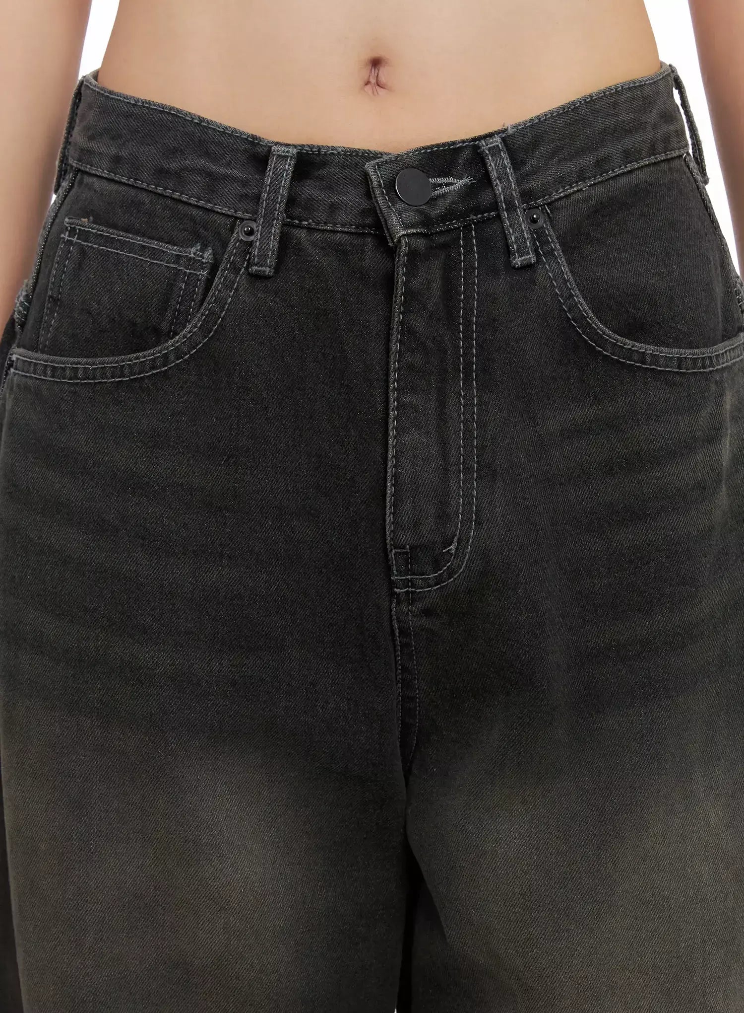 Hari Dark Washed Baggy Jeans IG527 in dark grey, close-up of waistband and front pockets on model, button fly, contrast stitching, and dark washed cotton denim texture visible.