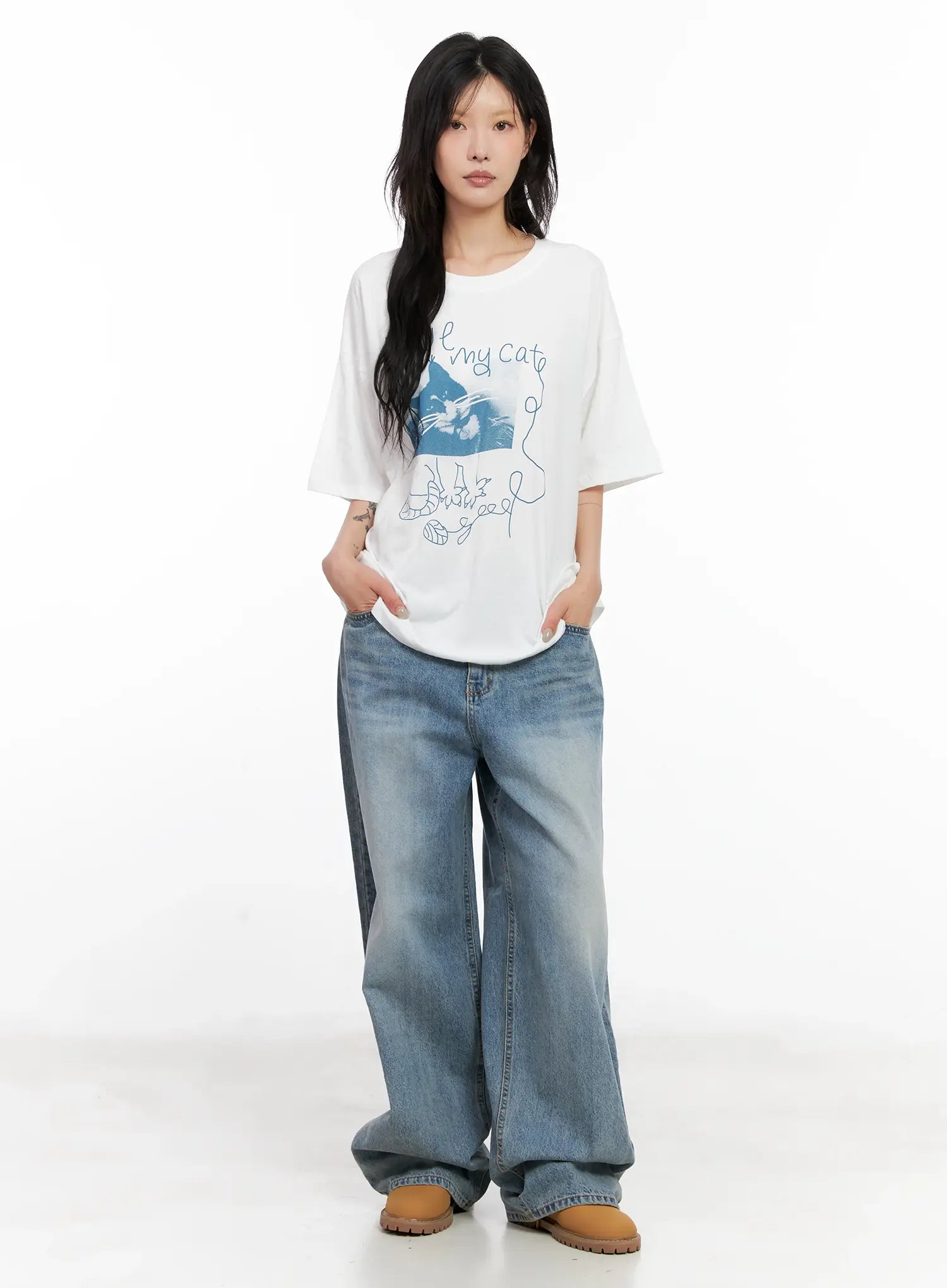 Koko Vintage-Wash Baggy Jeans CL528 in blue, front full-length on model standing neutral, wide-leg washed cotton denim paired with white graphic tee.